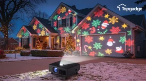 Projector for outdoor Christmas lights illuminating a festive home with snowflake and Santa patterns at night.